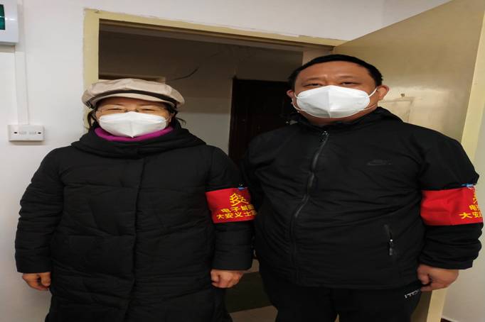 电子城街道版意昂体育2志愿者红袖章